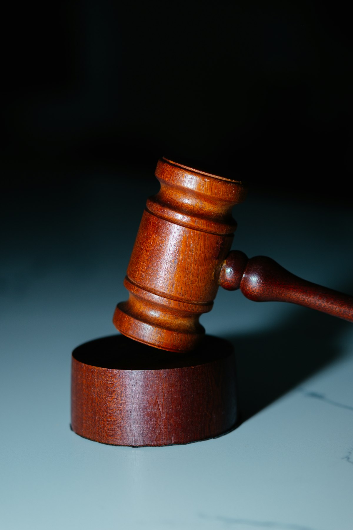 Wooden judge's gavel on a table representing the practice of law at LegalSolv